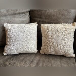 Set of Two Cream Crochet Throw Pillows. 14” square. Machine washable.